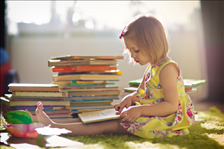 125/3882/little-girl-reading-stacks-of-books-early-childhood-literacy-childrens-books-middle.jpg