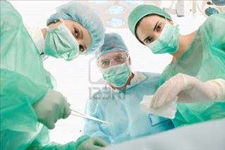 17/426/surgeons-at-work-operating-in-uniform-looking-at-camera-middle.jpg